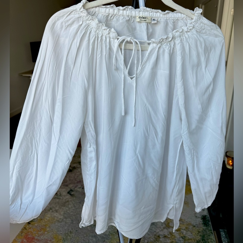 Selling this white flowy dylan blouse